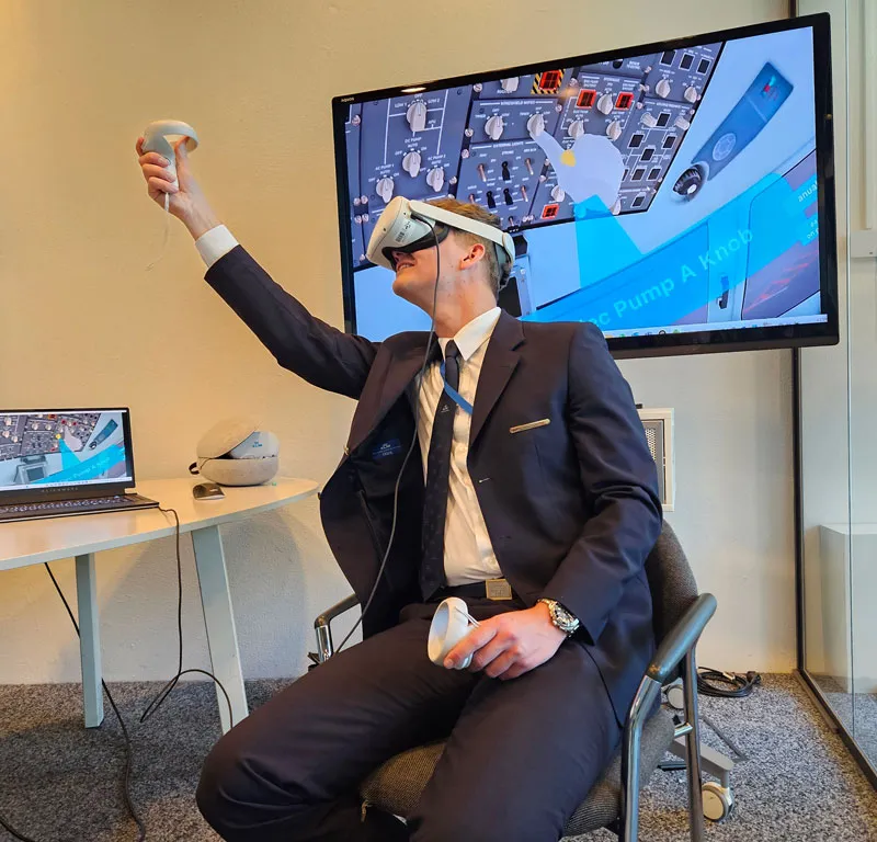 Airline staff wearing a Meta Quest headset, engaging in immersive training at Air France-KLM.